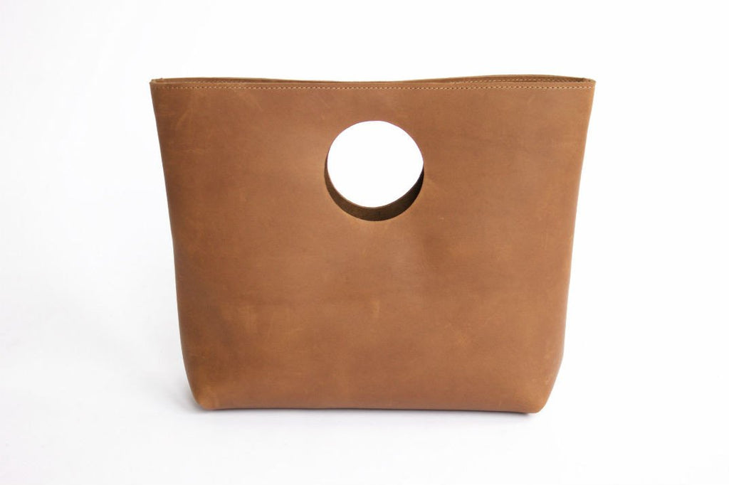 THE LEE LEATHER CIRCLE CLUTCH - CASUAL to FANCY